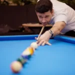 how to hold a pool stick