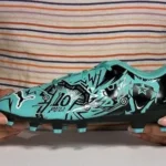 puma x pulisic kids' tacto ii fg soccer cleats